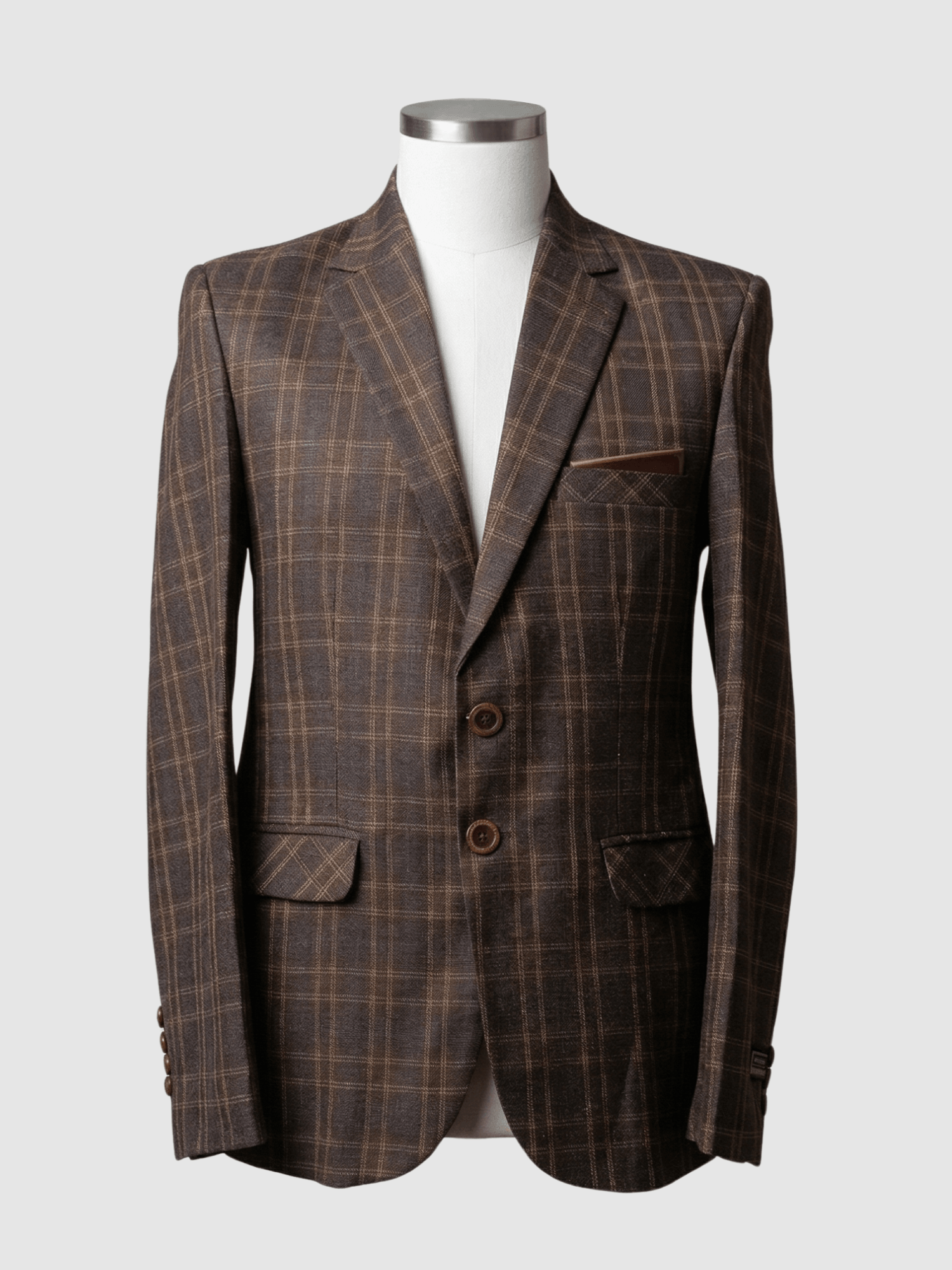 Turkish Brown Plaid Smart Fit Coat - Kamal Clan A men's tailored smart fit coat in a brown and tan plaid pattern on a mannequin. The coat features brown buttons and a solid brown pocket square. Turkish stitching and branded fabric are present.