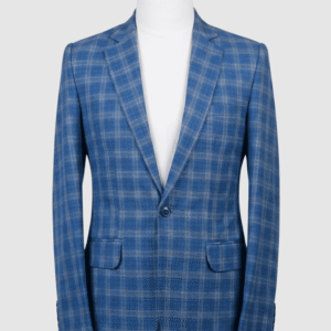 A tailored smart fit coat made of blue plaid Iranian fabric on a mannequin. The coat features a clean, simple design with matching blue buttons and no pocket square.