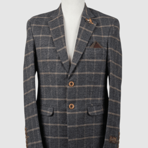 A tailored smart fit coat made of Iranian burgundy and charcoal grey plaid fabric on a mannequin. The coat features a subtle lapel pin, textured dark buttons, and a matching dark pocket square.