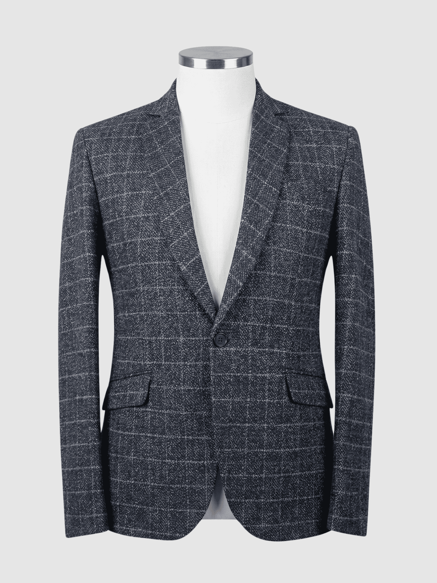 Iranian Fabric Charcoal Grid Smart Fit Coat - Kamal Clan A tailored smart fit coat made of charcoal grey grid patterned Iranian fabric on a mannequin. The coat features a clean, minimalist design with dark buttons and no pocket square.