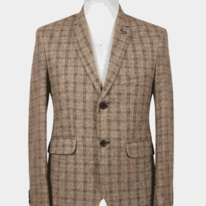A tailored smart fit coat made of tan and dark plaid Iranian fabric on a mannequin. The coat features a sleek lapel pin, dark contrasting buttons, and a clean breast pocket.