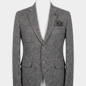 A tailored smart fit coat made of textured heather grey Iranian fabric on a mannequin. The coat features a dark double-knot lapel pin, matching grey buttons, and a dark patterned pocket square.
