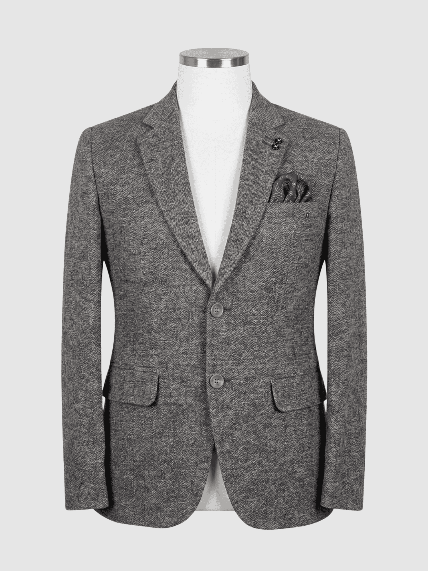 Iranian Fabric Textured Grey Smart Fit Coat - Kamal Clan A tailored smart fit coat made of textured heather grey Iranian fabric on a mannequin. The coat features a dark double-knot lapel pin, matching grey buttons, and a dark patterned pocket square.